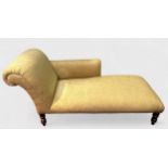 A Victorian-style chaise longue, with cream damask foliate upholstery and matching bolster