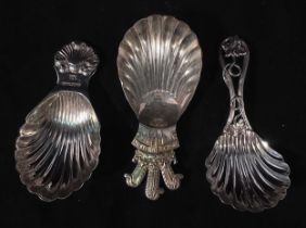 Three various silver caddy spoons including an Elizabeth II hallmarked spoon with handle modelled as