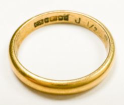 A 22ct yellow gold wedding ring, 2mm, weighs 3.3 grams.