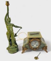 A late 19th Century French onyx and spelter figural figural mantel clock, converted to a lamp,