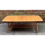 An Ercol blonde elm Windsor low coffee table, model no. 459, of rectangular form, with rounded