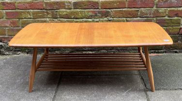 An Ercol blonde elm Windsor low coffee table, model no. 459, of rectangular form, with rounded