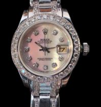 A ladies 18ct white gold Rolex Datejust Pearlmaster wristwatch, the mother of pearl dial with