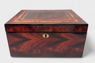 A Rapport London burr wood effect watch box, with lined and compartmented interior with eight