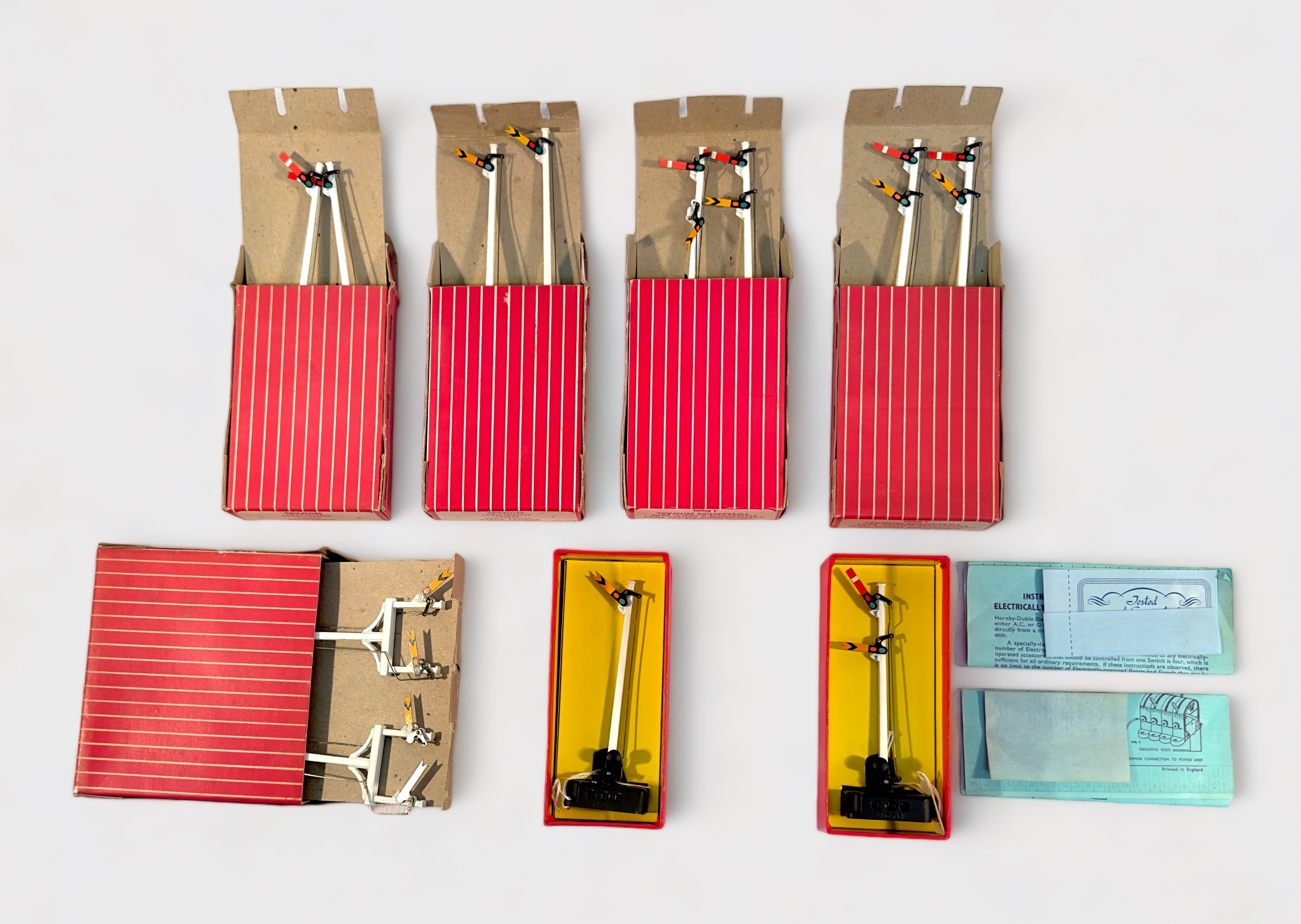 Seven various boxed Hornby-Dublo ‘OO’ gauge semaphore signal kits, comprising, Single Arm Signal -