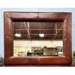 A large modern brown leather framed rectangular mirror, 68cm x 89cm