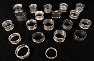 A collection of twenty various silver napkin rings, gross weight approximately 12.05ozt