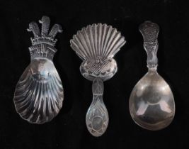 Three assorted silver caddy spoons, including a Georgian example by John Bettridge, hallmarked