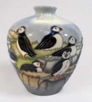 A Moorcroft Pottery vase in the ‘Puffin’ design, of ovoid form, with small flared rim (chip to