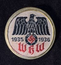 A Winterhilfswerke (WHW) 1935-1936 badge, inscribed to back 'Dr. R. Morisse & Co. 'Wuppertal'. 3cm