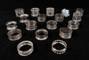 Eighteen various silver napkin rings, gross weight approximately 11.2ozt