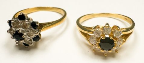 Two 18ct yellow yellow gold sapphire and diamond dress rings, both claw set in a daisy cluster
