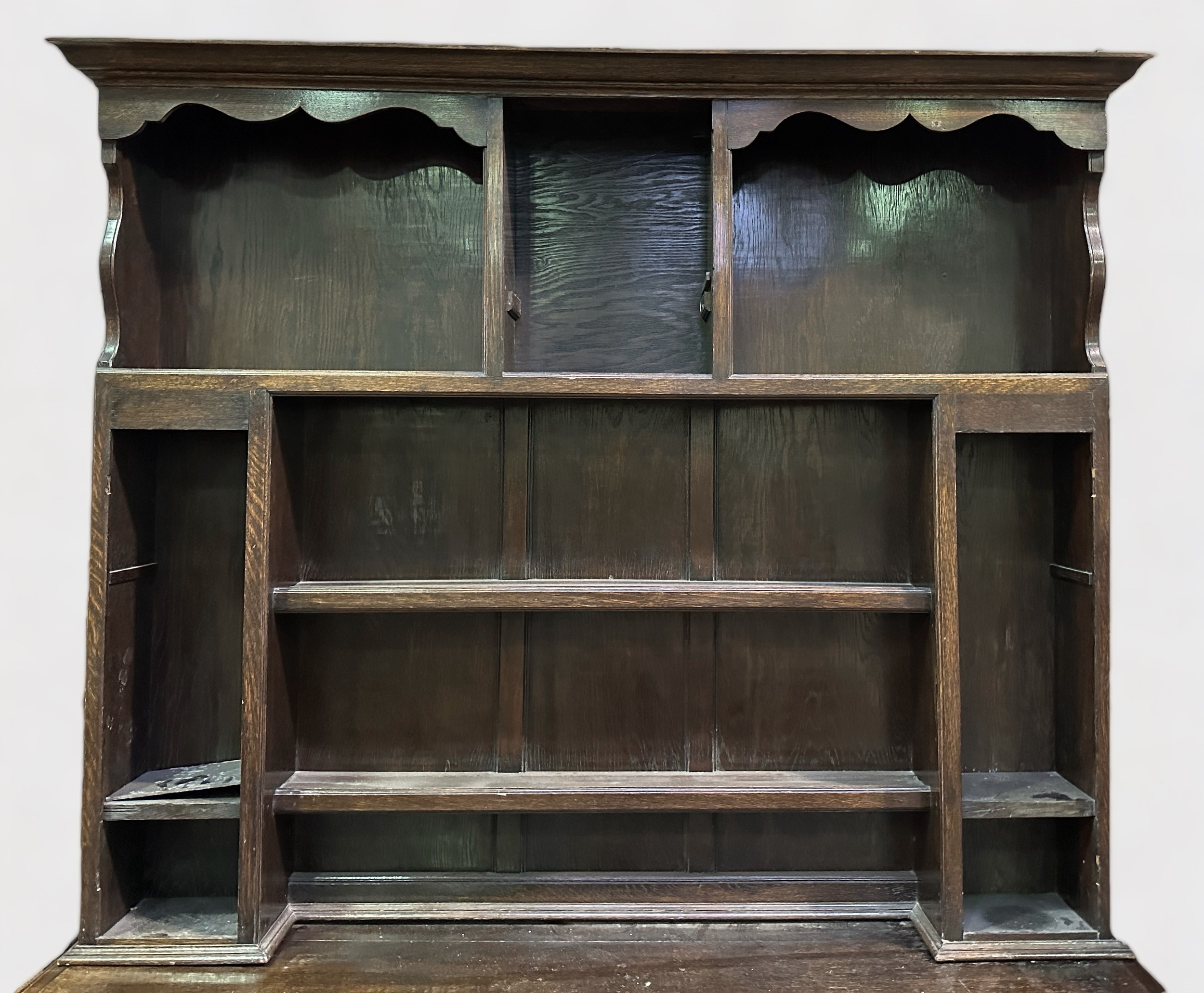 An 18th century and later oak dresser, the later raised back section with shaped cornice, above - Image 2 of 2