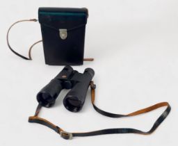 A pair of Leitz 7 x 42B 140m/1000m Trinovid binoculars, stamped and numbered ‘Portugal 849972’, in