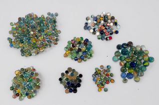 A small quantity of assorted glass marbles including earlier examples