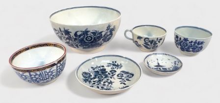 An 18th Century Worcester Porcelain teacup, matching saucer, teabowl and slop bowl painted