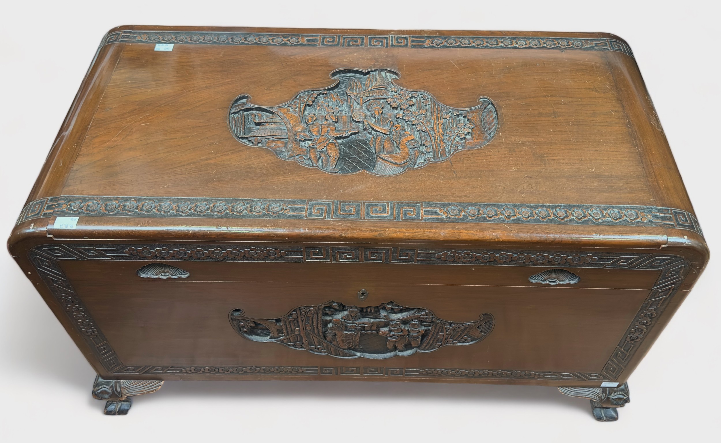 An Oriental carved camphor wood blanket chest, of rectangular form with hinged top, inset carved - Image 2 of 3