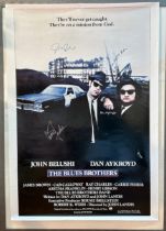 A ‘The Blues Brothers’ film poster, signed in blue, black and silver pen by James Brown, John