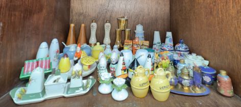 Approximately forty-five assorted novelty salt and pepper pots, including Carlton Ware, Crown Devon,