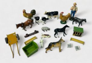 A collection of assorted play-worn painted lead farm animals and figures, including some examples by