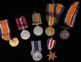 Seven medals comorising: A WW1 Great War and Victory Medal pair to 359744 Private R.E. Hartley /
