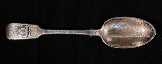 A Victorian 'fiddle' pattern silver spoon with mounted enamel badge of the 2nd Bt. Queen's Own