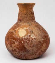 An Early Bronze Age Polished Red Ware Pottery Bottle, Cyprus, circa 2500 BC, of globular form with