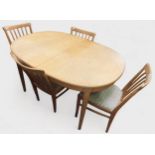 Carl Malmsten (Sweden, 1888-1972) A 'Herrgården' light burr wood extending dining table, with two