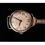 A ladies vintage 9ct gold cased wristwatch, the silvered dial inscribed ‘Crusader’ and with Arabic