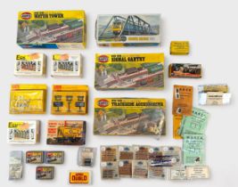 A collection of assorted boxed ‘OO’ gauge build kits, trackside accessories and train and station