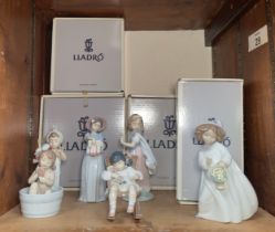 Four various boxed Lladro porcelain figures, comprising, Happiness, 06685, Bathing Beauties,