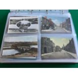 Two albums containing around 300 standard size postcards of the Northumberland area. Lots of