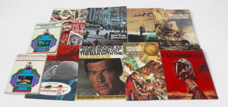 A collection of film souvenir programmes, magazines, and reviews, including Superman: The Movie,