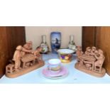 A pair of Grasso unglazed terracotta figure groups of card players and cheating card players,