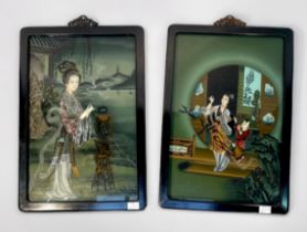 A pair of early 20th century Chinese reverse-painted rectanular glass panels, painted with a lady