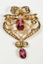 A 15ct yellow gold pendant, claw-set with an oval-shaped pink topaz to the centre, surrounded by
