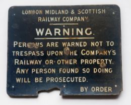 An L.M.S. enamel trespass sign, white text to black ground, ‘London, Midland & Scottish Railway