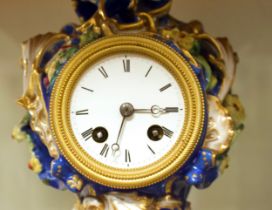 A 19th Century porcelain mantel clock, the eight-day movement striking a bell, marked ‘Delolme á