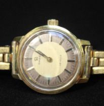 A ladies gold-plated Omega De Ville manual wind wristwatch, the gilt dial with applied gilt batons