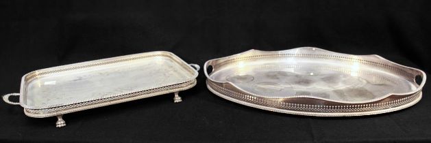 Two various large two-handle silver-plated trays with pierced gallery, a pair of three-light