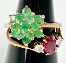 A 9ct gold dress ring, in a three-tier cluster design, set with 13 x small emeralds, ring weighs 2.3