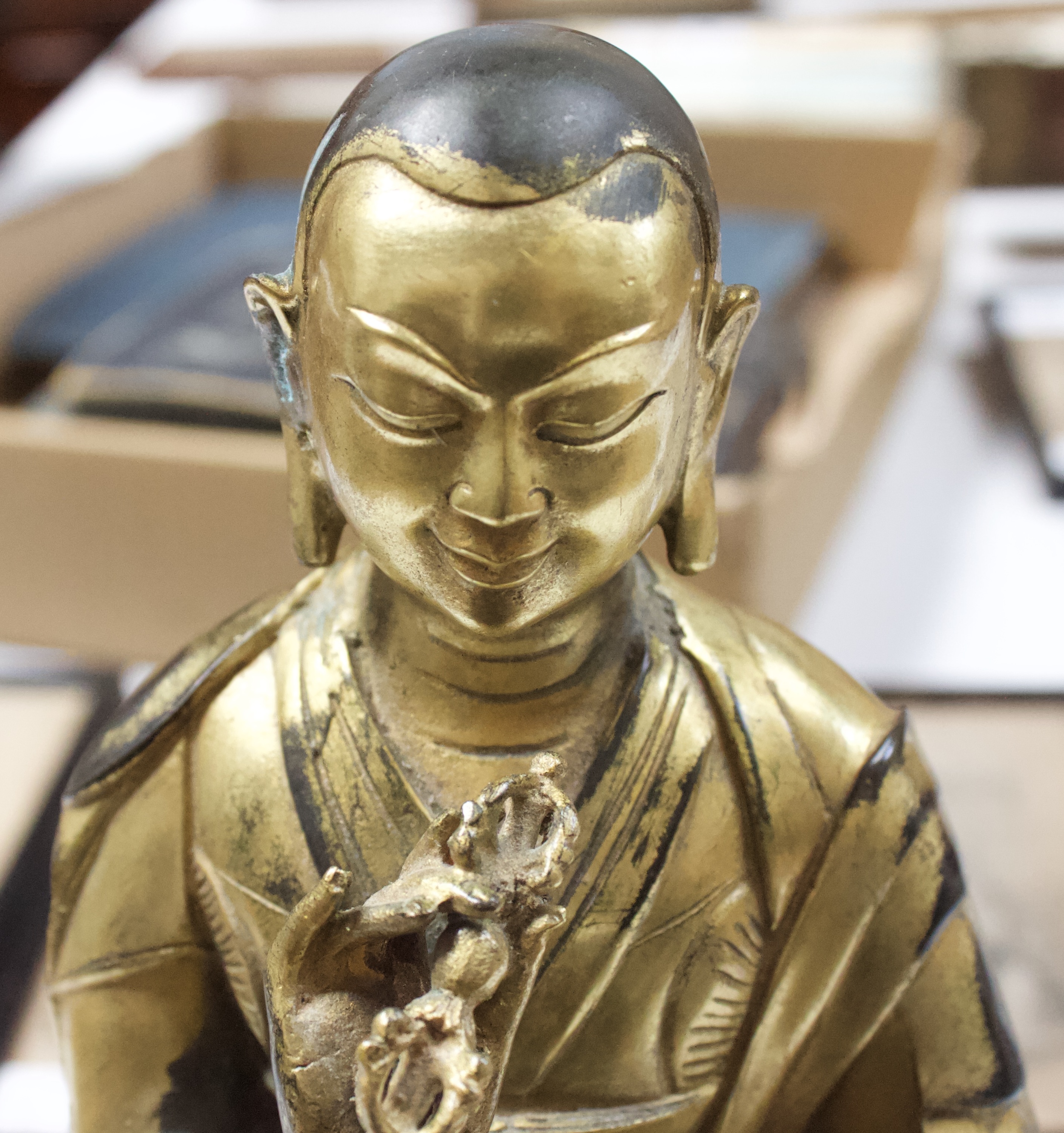 A Gilt-bronze Tibetan style Buddha, seated in lotus position and holding a vajra and meditiation - Image 5 of 14