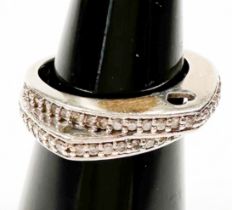 A 9ct white gold dress ring, off set with two rows of diamonds, estimated total diamond weight 0.