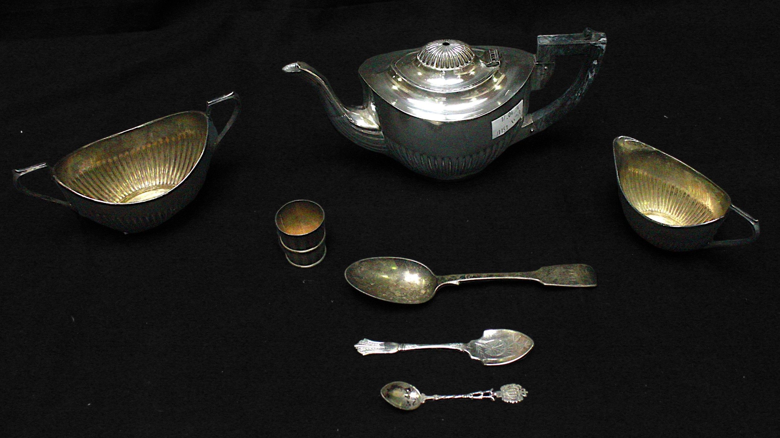 A Victorian silver fiddle pattern dessert spoon, and a white-metal 'coopered bucket' spirit shot