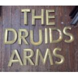 A collection of 13 gilded resin advertising letters, spelling out ‘The Druids Arms’, each letter