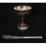 A Chinese Export Silver goblet, with shallow circular bowl embossed and chased with a dragon, the