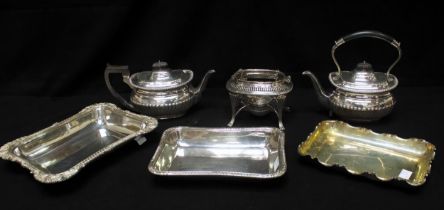 A collection of assorted silver-plated wares including wine coasters, a teapot with spirit burner,