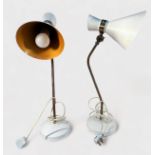 A pair of modern table lamps with adjustable lacquered brass standards, white-painted metal bases