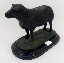 A cast metal verdigris bronzed sculpture of a sheep, signed ‘Jolie Moigniez’, probably after the