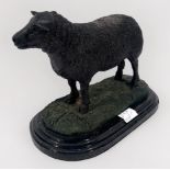 A cast metal verdigris bronzed sculpture of a sheep, signed ‘Jolie Moigniez’, probably after the